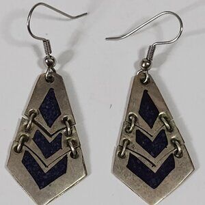 These vintage signed Mexico 925 sterling silver earrings are a beautiful and uni